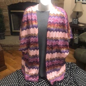 Shawl multi color; pinks purples gold wine colors.